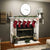 old fireplace with brass glass doors, white mantel, white tile and stockings and candles