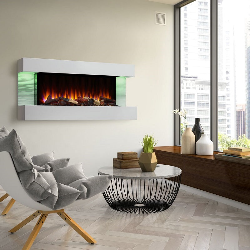 electric fireplace on condo wall in multi-family building with accent chairs, vases, and coffee table