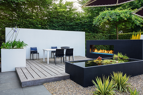 custom see-through outdoor gas fireplace on patio