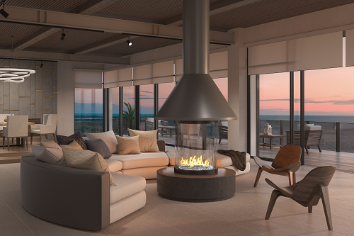 custom gas fireplace round circular fireplace in living room with curved couch overlooking sunset