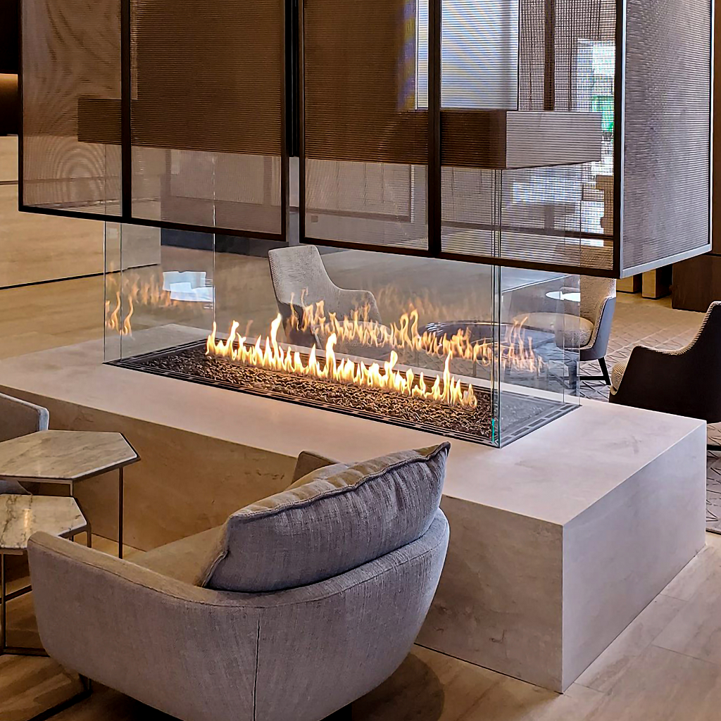 four sided island gas fireplace in hotel business lobby from fireside hearth and home